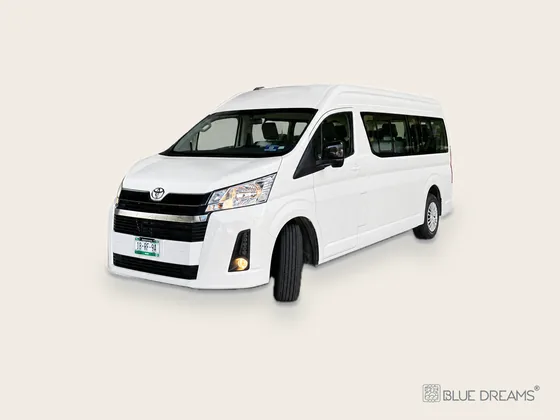 White Toyota Hiace van from Blue Dreams for a private transfer from Cancun Airport to the Holbox ferry